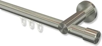 A close-up studio shot of a curtain rod with hooks.