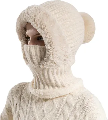 A person wearing a knitted hat with a built-in face mask and a matching sweater.