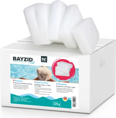 A box of white foam filter segments for a pool, with a person relaxing in a pool in the background.