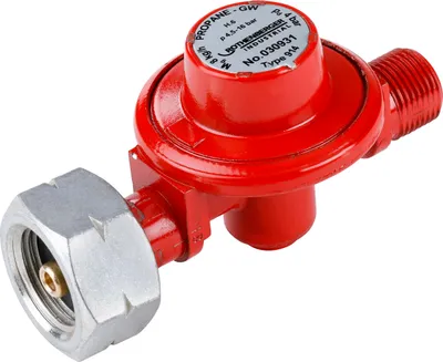 A red propane gas pressure regulator with silver fittings against a white background.