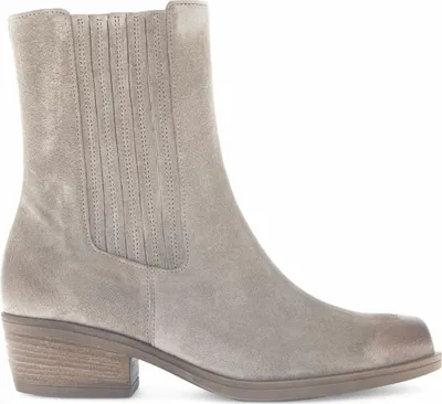 A single beige suede boot is shown against a white background.