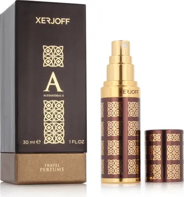 A box and a perfume bottle with its cap are displayed side-by-side against a white background.
