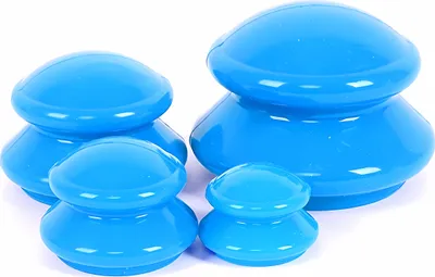 Four blue silicone suction cups of varying sizes are arranged on a white background.