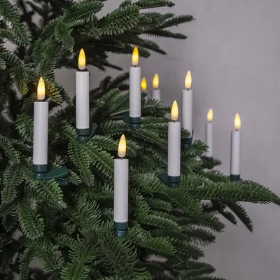 LED candles attached to a Christmas tree.