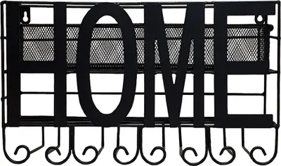 A black metal wall-mounted organizer with the word "HOME" cut out.