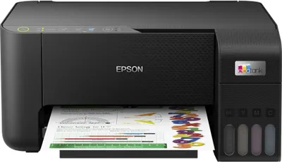 A black Epson EcoTank printer is shown printing a document with colorful letters and charts.