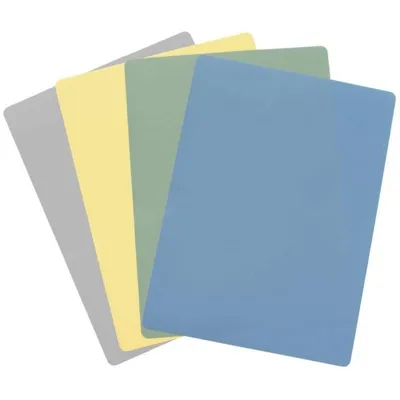 Four flexible cutting mats in pastel colors are fanned out against a white background.