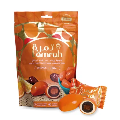 Produktbild von Tamrah Datteln in Orangen-Schokolade mit Orangenscheibe 100 g