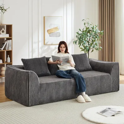 Image de Canapé en velours côtelé aux lignes courbes, 235 cm, dossier en pente douce, 2 coussins inclus, gris