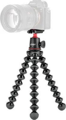 A black Joby GorillaPod tripod with a camera mounted on top.
