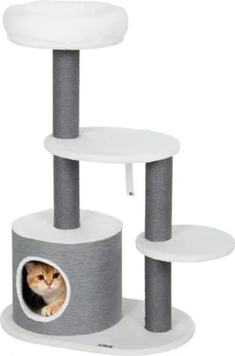 A multi-level cat tree with scratching posts and platforms, featuring a cat peeking out of a den.