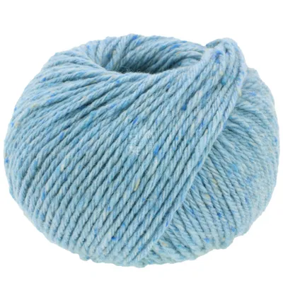 A ball of light blue yarn with flecks of white and yellow.
