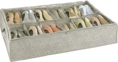A shoe organizer with multiple compartments filled with shoes.