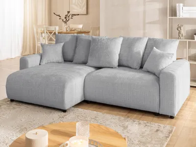 Produktbild von Calma - Komfortables Ecksofa im Bumpy-Design mit Schlaffunktion und Bettkasten aus weichem Hellgrau Chenille-Stoff