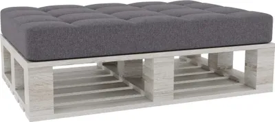 A tufted dark gray cushion on a white wooden pallet base, presented against a white background.