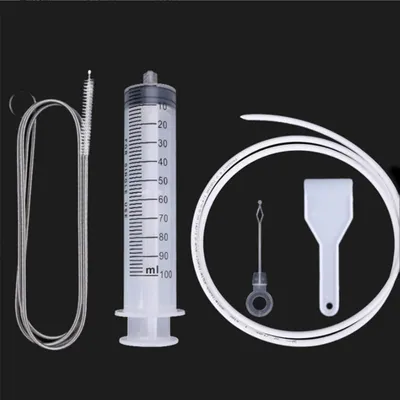 Image de Kit de nettoyage pour réfrigérateur, comprenant une brosse et une seringue