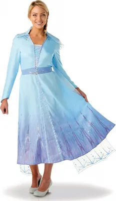 A woman is modeling a blue dress.