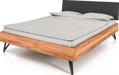 Produktbild von Bett Rolo 1 in 140x200 cm aus Kernbuche massiv mit Polsterkopfteil in Schwarz