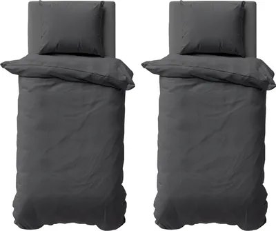 Two identical beds with bedding are shown from a top-down perspective.