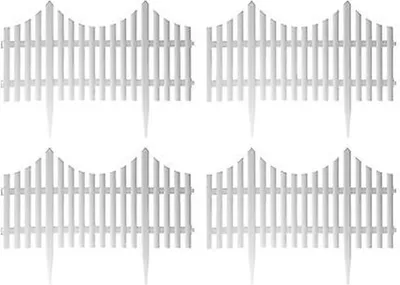 Four white picket fence sections arranged in a 2x2 grid.