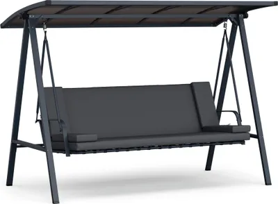 A garden swing chair with a canopy, shown in a studio setting.