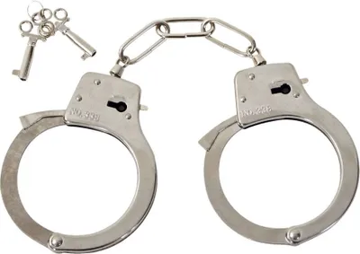 A pair of metal handcuffs with a chain and two keys, presented on a white background.