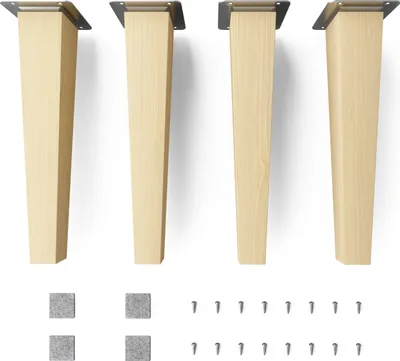 Four wooden furniture legs with metal mounting plates are displayed, along with two sets of square gray pads and a collection of screws.