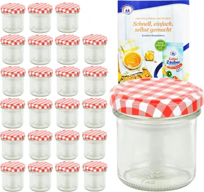 A set of glass jars with red and white checkered lids, along with a recipe booklet.