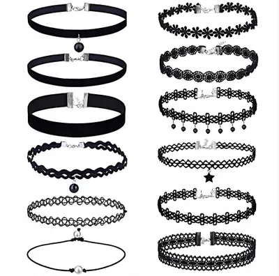 A collection of black chokers arranged in two columns against a white background.