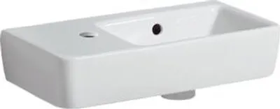 Zdjęcie produktu dla Geberit umywalka spłukiwana ręcznie RENOVA COMPACT 500 x 250 mm, z przelewem, półka po lewej, otwór na baterię po lewej biały