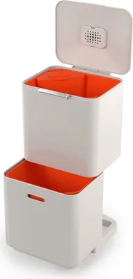 A stacked two-tier trash and recycling bin with orange interiors and a white exterior.