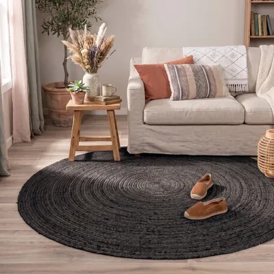 Produktbild von Volero - Jute Teppich Rund - Fair Schwarz - Ø 140 cm - Wohnzimmer, Esszimmer, Schlafzimmer - Boho, Ländlich, Modern