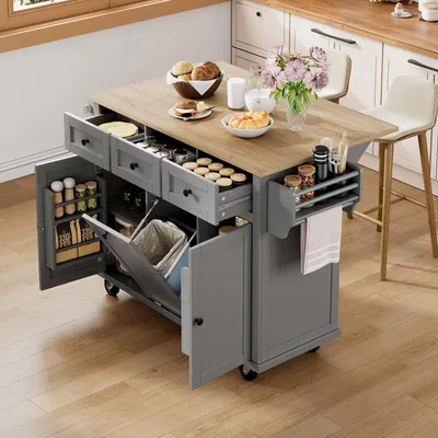 A gray kitchen island with a wooden countertop is shown in a kitchen setting, with stools in the background.