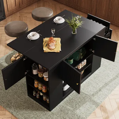 A black kitchen island with storage and a fold-out table, set up in a kitchen or dining area with stools and food.