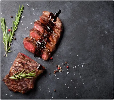 Produktbild von Spritzschutz Herdabdeckplatte Schneidebrett aus Glas Steak mit Salz und Pfeffer 1-Teilig (60x52cm)