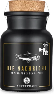 A black glass jar with a cork lid, featuring a label with a fish illustration and text.