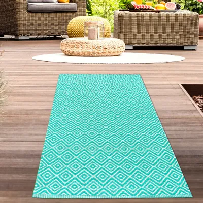 Produktbild von Stilvoller Outdoor-Teppich mit klassischem Rautenmuster in petrol Größe - 90 x 150 cm