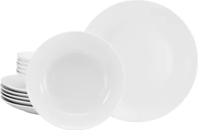 A set of white porcelain plates and bowls stacked and arranged on a white background.