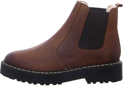 A side view of a brown Chelsea boot with a black sole.