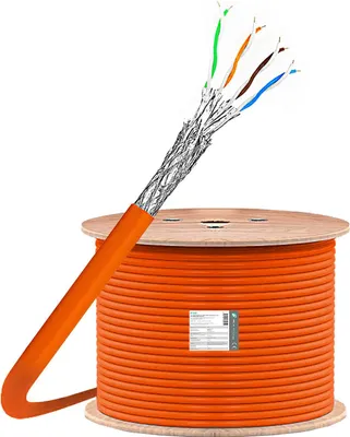 A large spool of orange network cable with the end of the cable showing the individual wires.