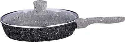 A frying pan with a glass lid, shown from a side angle against a white background.