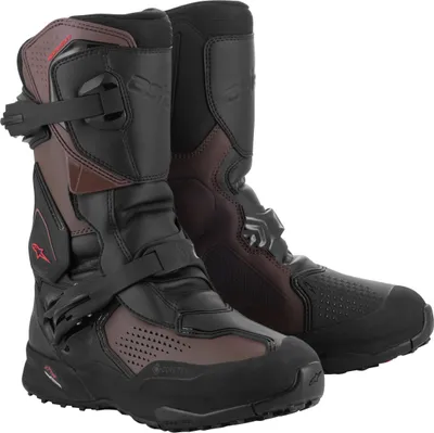 A pair of black and brown motorcycle boots.