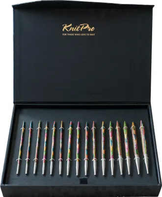 A set of knitting needles in a black presentation box.