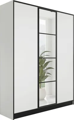 A white wardrobe with black trim and glass panels, showing a plant inside.