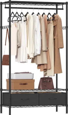 A SONGMICS open wardrobe rack with clothes hanging on it and storage drawers at the bottom.