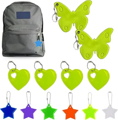A collection of reflective keychains and a backpack.