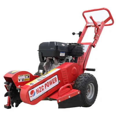 A red stump grinder with a black engine, shown on a white background.