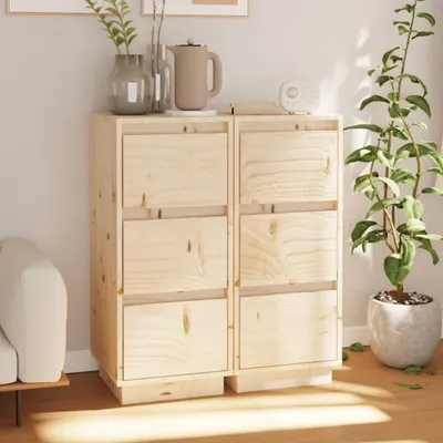 A wooden sideboard with drawers in a room setting.
