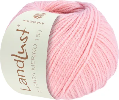 A ball of pink yarn with a label.