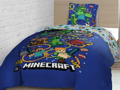 A Minecraft-themed duvet cover and pillowcase set displayed on a bed.
